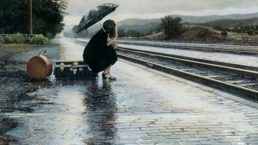 Girl-waiting-alone-in-rain-near-railway-tracks-lost-love-image